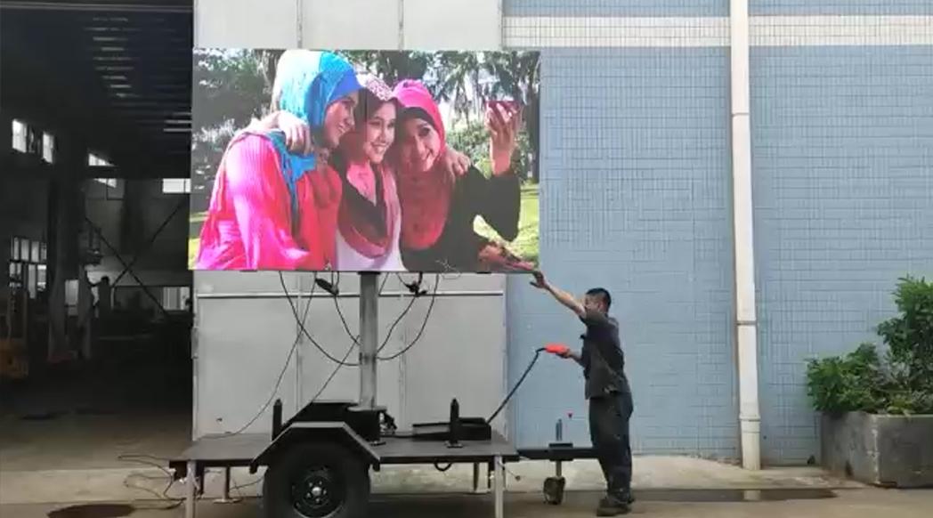 LED advertising trailer lifting and rotating display